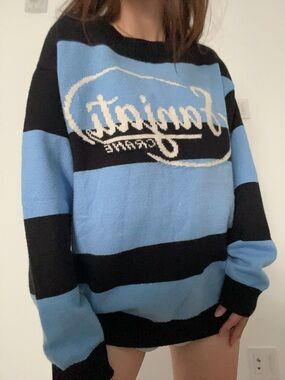 Sanjati crane blue & black sweater